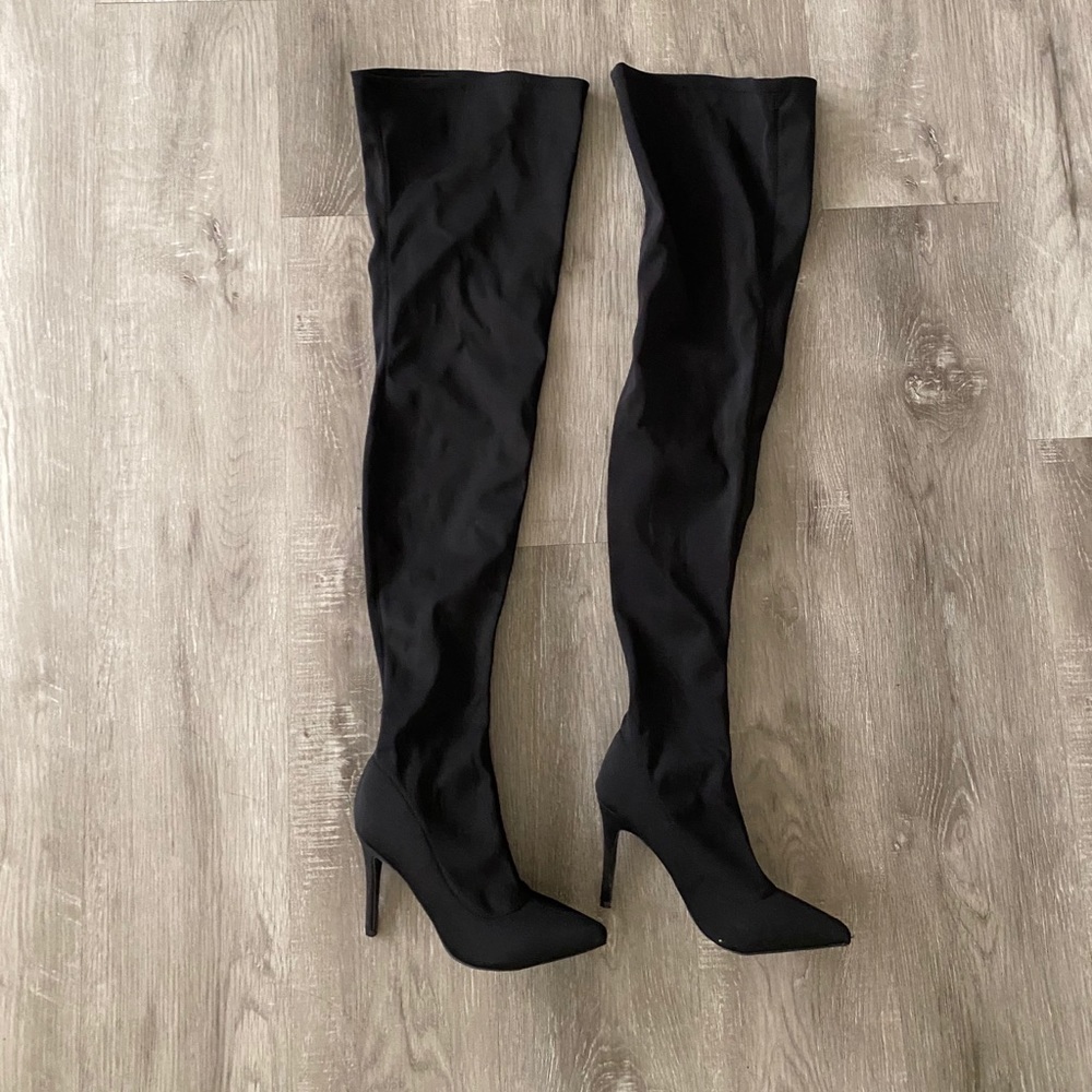 Extremely long thigh high boots